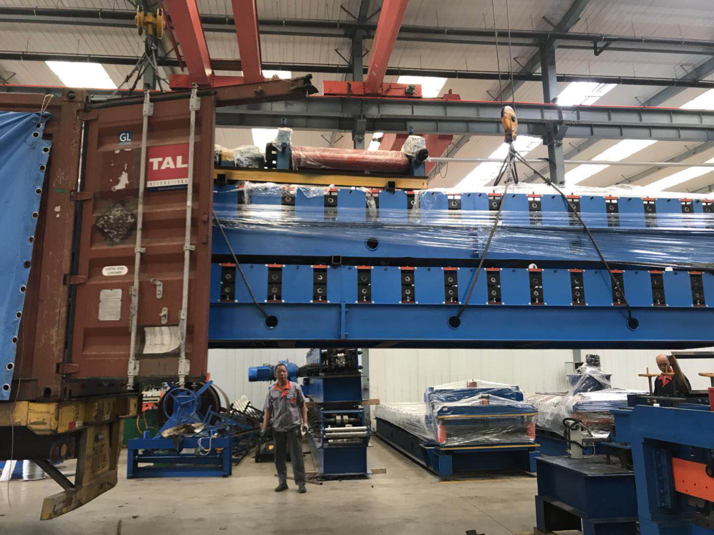 Loading roll forming  machines in Container